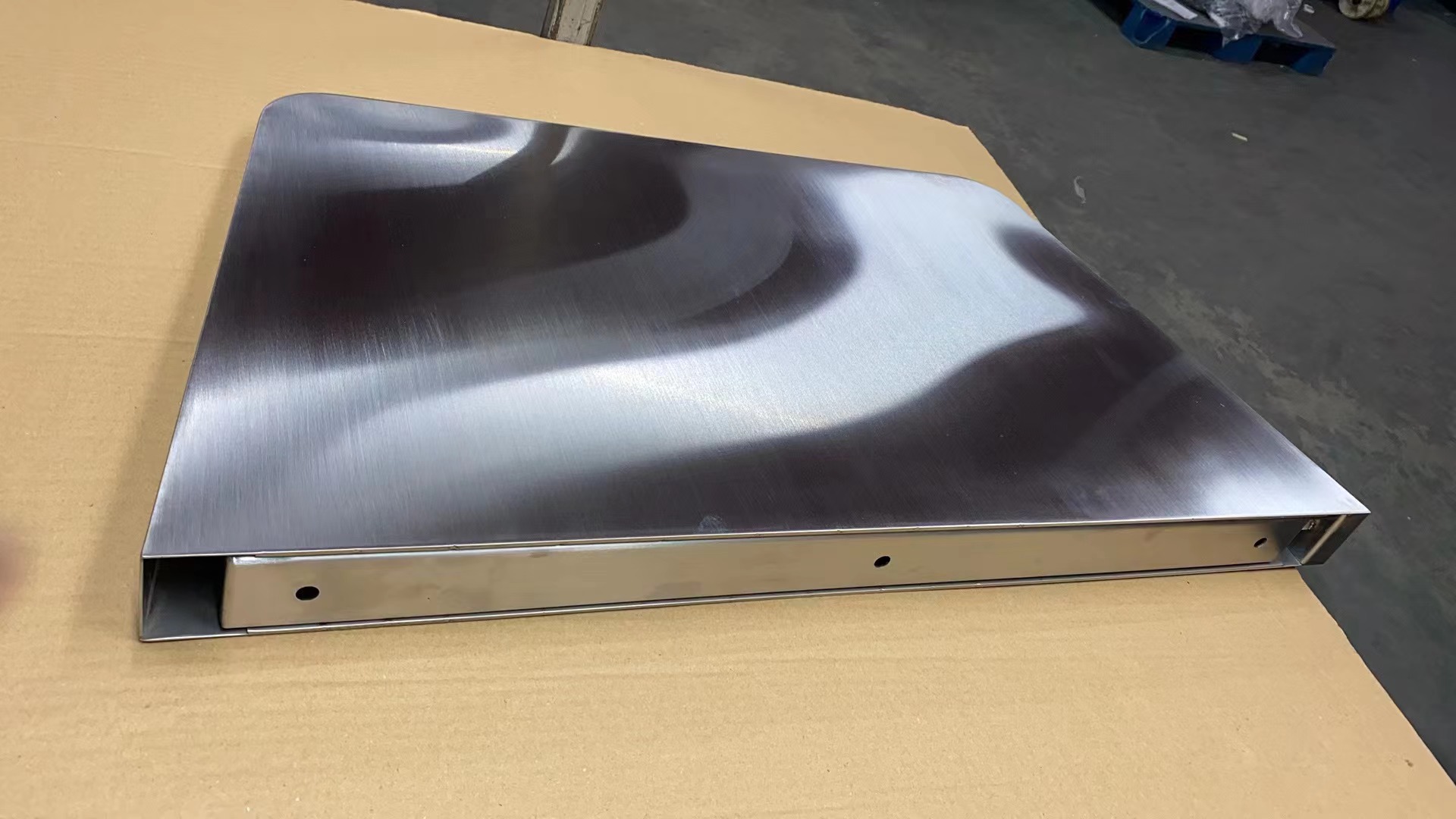 Brushed satin finish detail of stainless steel toilet privacy screen