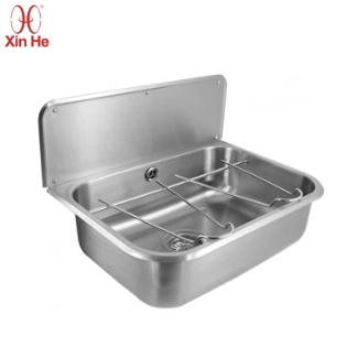 Industrial-grade mop sink made of stainless steel for warehouse cleaning and janitorial maintenance tasks