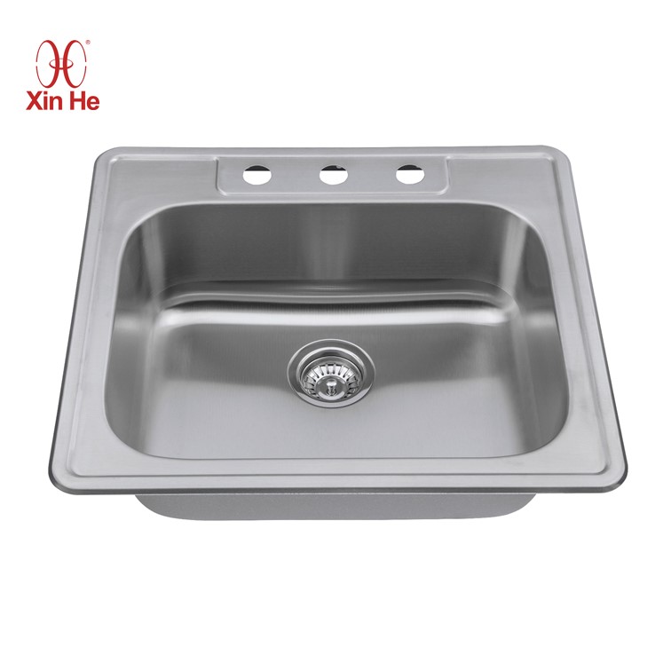 Single bowl stainless sink offers ample space for washing large pots and efficient cleaning in modern kitchens