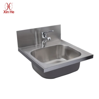 Wall-mounted hands-free wash basin with knee control for safe sanitation in medical and catering zones