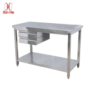 Drawer-equipped commercial kitchen table designed for cooking stations, tool storage, and daily food prep