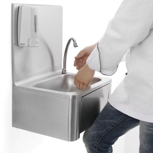 Knee-operated commercial hand sink for hands-free washing, ensuring high hygiene standards and kitchen compliance