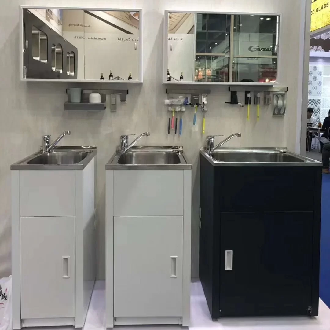 Commercial laundry sink with stainless steel cabinet for hotel utility room storage
