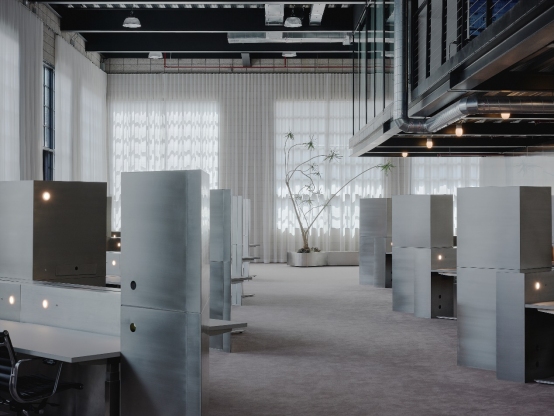 Tailored metal manufacturing and custom stainless steel fabrication for minimalist architectural office partitions